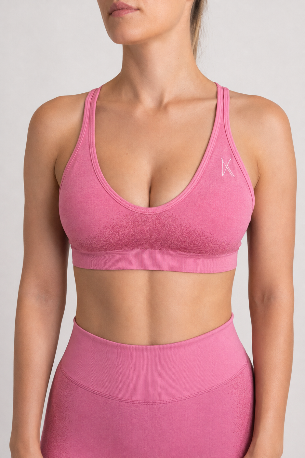 Pink strappy back sports bra - back view -Ak Fitness